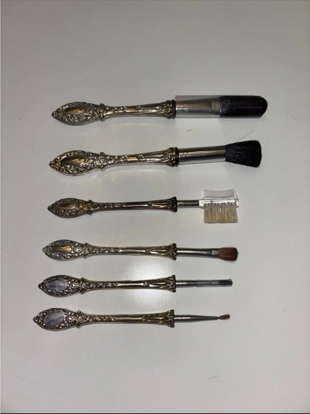 Vintage 6-piece silver-plated makeup brush vanity set with ornate scroll handle